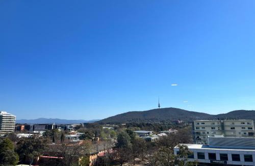 Braddon Apartment | Midnight Luxe 1BR Apartment in the heart of Braddon Views from L7 Pool Sauna Gym Secure Parking Wifi Wine