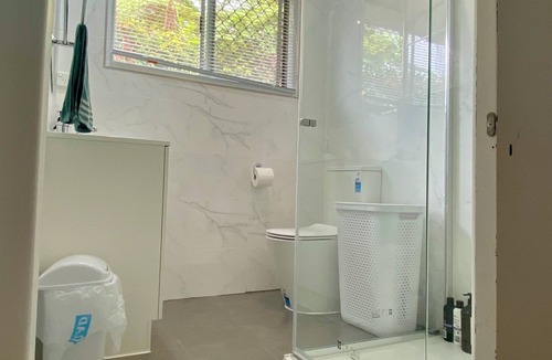 Centenary Heights Apartment | Modern Studio Room Retreat with a reverse Aircon