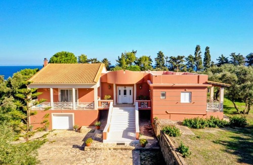 Akrotiri Villa | Olas y olivos