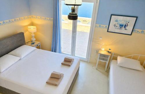 Agios Ioannis Villa | On the Rocks Villa w Hot Tub at Cavo Delos