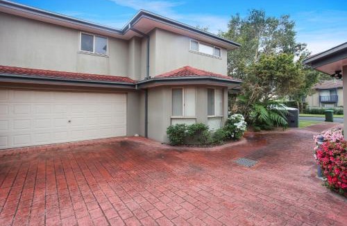 Hawks Nest House | One Street Back from the Surf Beach