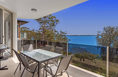 Nelson Bay House | Perched above Dutchies Beach with views over the bay