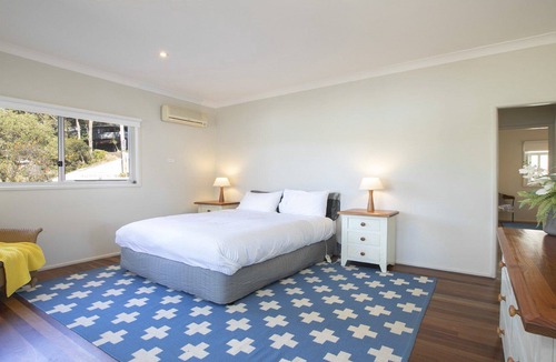 Hardys Bay House | Perfect NE aspect for sunny winter days and a fireplace at night