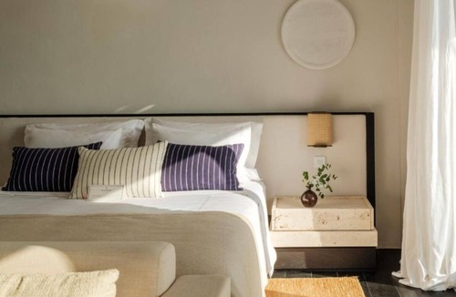 Drafaki Hotel | Private Pool Suite w/Warm Interiors & Spectacular Sunset Views of Mykonos