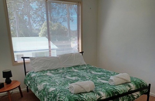 Batehaven House | Quiet House, amongst spotted gum trees, just minutes from beaches & shops.
