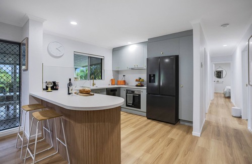 Mooroobool House | Refreshed Family Home with Large Deck and Tropical Mountain View