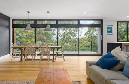 Horsfield Bay House | Relax with bush & water views