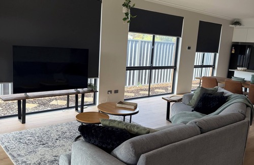 Singleton House | Seaside EscapenKick back and relax in this calm, stylish space.