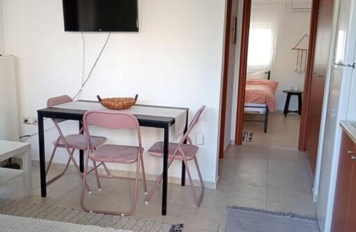 Ixia Apartment | Sunny mountain view apartment with free parking