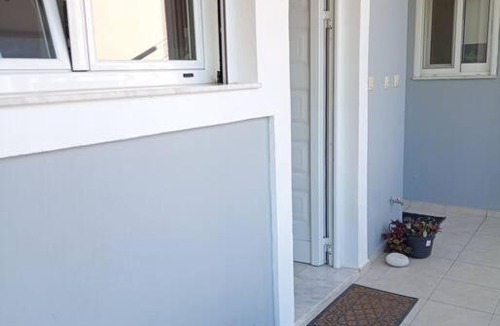 Ixia Apartment | Sunny mountain view apartment with free parking