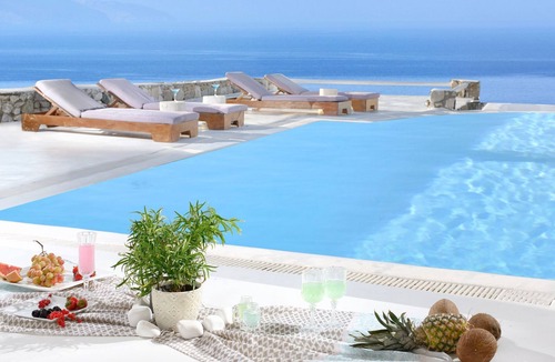 Agios Ioannis House | SUPERB BEACH ACCESS LUXURY SEA VILLA POOL by Calypso Sunset by Interhome
