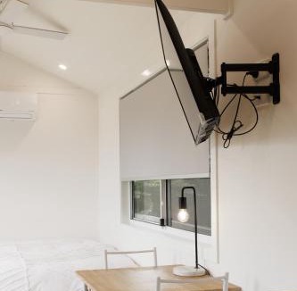 Wollongong Ski Chalet | Sweet beautiful TINY HOME with pool and 2 minute drive to the beach