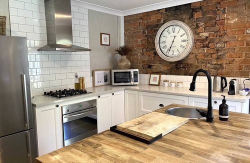 Orange House | The Edward Townhouse 151 | Tastefully Styled