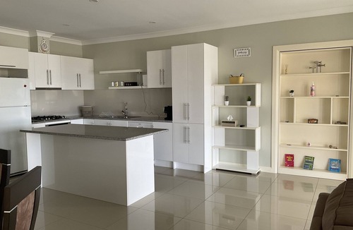 North Beach House | The happy place-Comfortable 3 bedroom home with sea views. Steps to the beach.