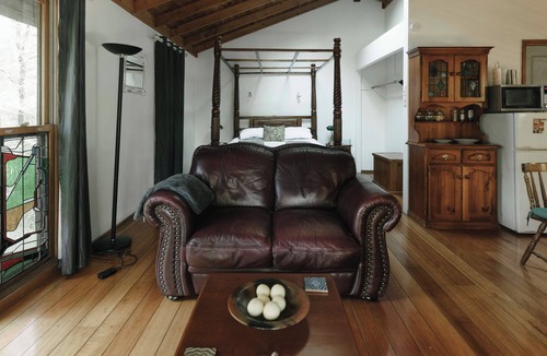 Bandon Grove Cabin | The Lilypond - a beautiful escape with log fire & spa bath surrounded by nature.