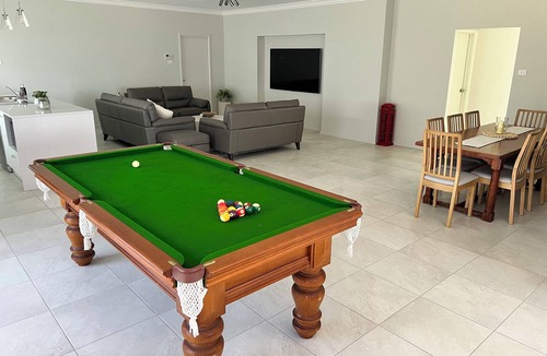Tuross Head House | The Ocean’s Edge is a contemporary coastal home with stunning beach views.