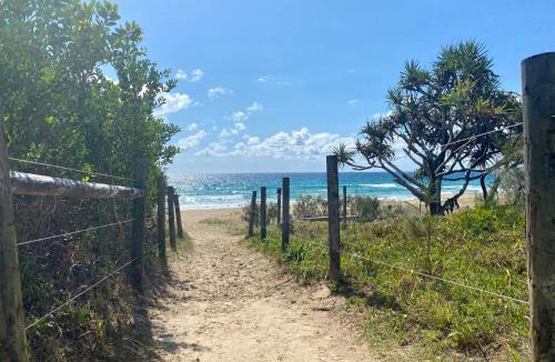 Mudjimba House | The Palm - Beachside Home with Heated Pool, Cinema & Games Room