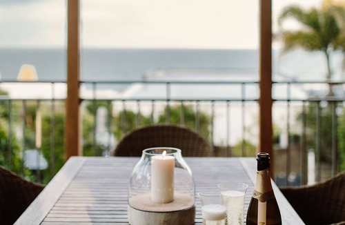 Sunrise Beach Apartment | Tranquil Treetop Retreat with Pool and Ocean Views