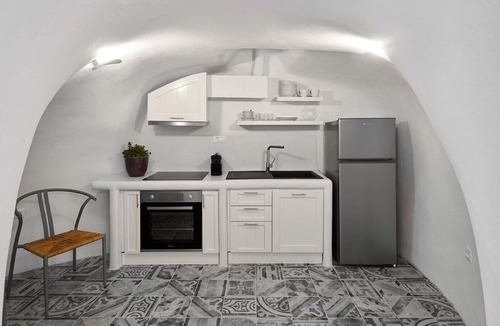 Megalochori Villa | Two Cave Houses with Private Garden Courtyard