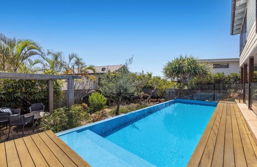 Emerald Beach House | Victoria’s Poolside Emerald Beach stay with Shared Pool, Near Beach and Cafes.