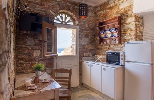 Panormos Villa | Villa Perraki - Limestone and marble accented villa on Rochari Beach