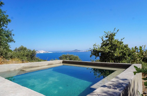 Mandraki House | villasglamp. Old Stone House in 2 000 sqm garden. Plunge pool. Sea Views.
