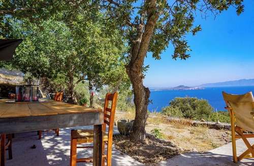 Mandraki House | villasglamp. Old Stone House in 2 000 sqm garden. Plunge pool. Sea Views.