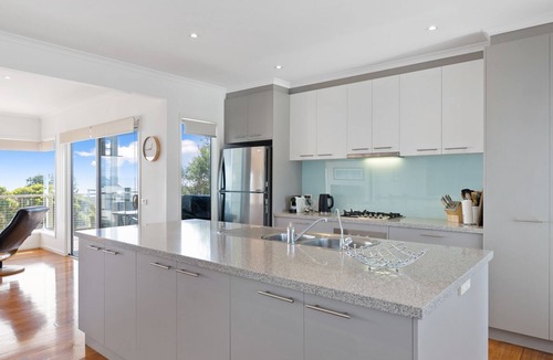 Ventnor House | Wake up to panoramic ocean views every day in this beautifully designed coastal haven, where comfort