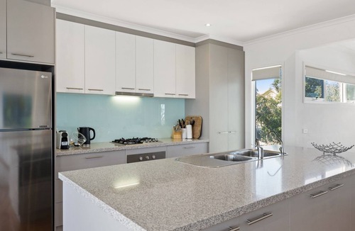 Ventnor House | Wake up to panoramic ocean views every day in this beautifully designed coastal haven, where comfort