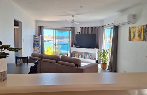 New Port Apartment | Waterfront Property with lovely views. Wake up to the dolphins and Swimming