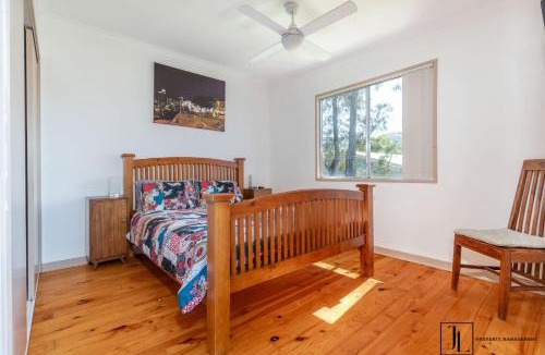 Malua Bay House | Whispering Palms - Ocean Views