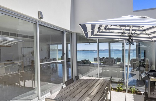 Corlette House | Whitehouse On The Water - Palatial Home on Idyllic Beach