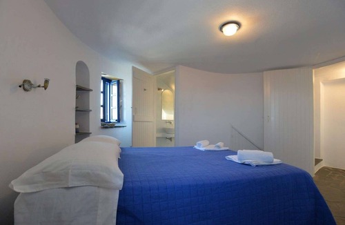 Tinos Town House | Windmill and houses by the sea // Stavros Bay