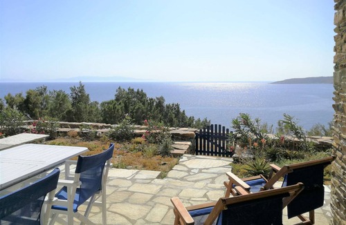 Tinos Town House | Windmill and houses by the sea // Stavros Bay