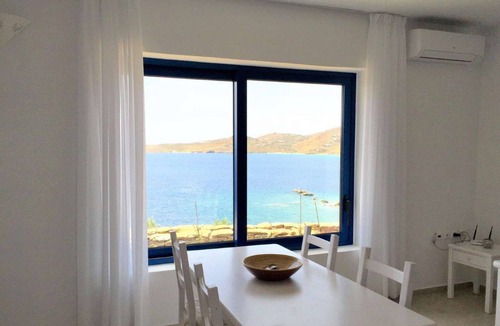Tinos Town House | Windmill and houses by the sea // Stavros Bay