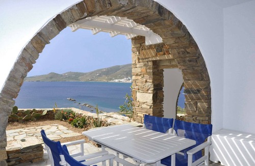 Tinos Town House | Windmill and houses by the sea // Stavros Bay