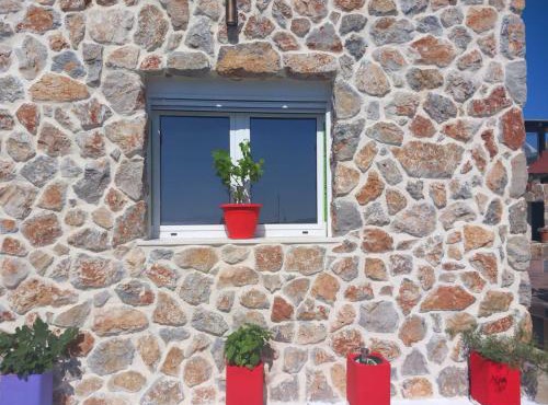 Anemomylos House
