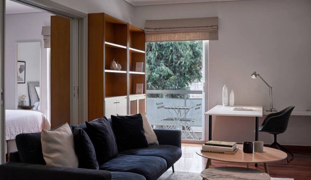 Chic designer home next - Hilton in Athina