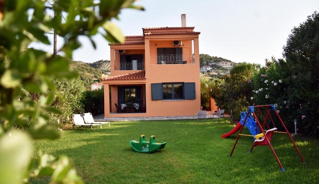 Eliza 2 bedroom sunny beach house with sea view in Mourteri