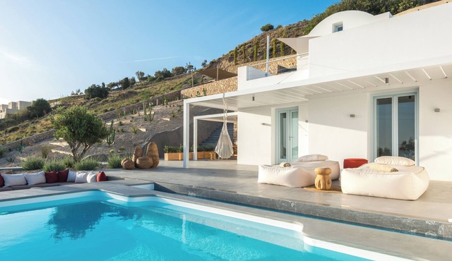 Exclusive dual-suite unit with private infinity pools at Santorini Heights in Pirgos Kallistis