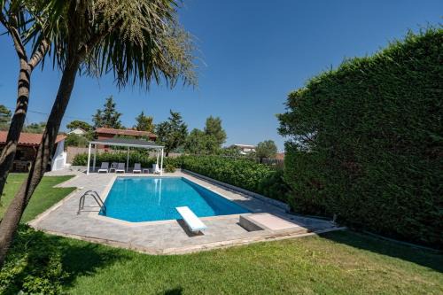 Poolside Paradise Dilesi by ΜΡS in Dhílesi