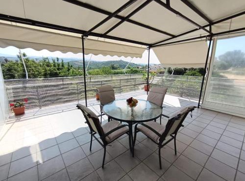 Veranda with Endless View among Orange Trees in Platanias
