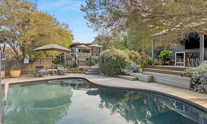 St. Andrews Beach House | Elandra by Ready Set Stay - Outdoor solar heated pool, WIFI, BBQ, linen