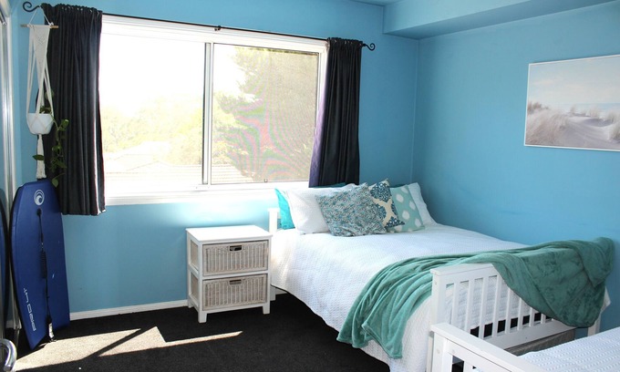 Corlette House | Family home 5 minutes walk to the beach. Fur babies welcome!