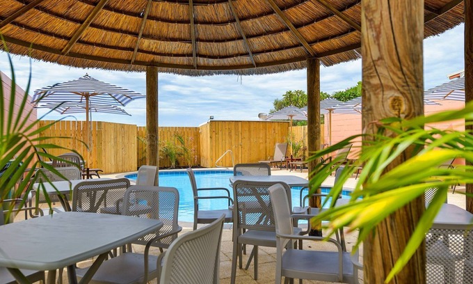 Exmouth Villa | Osprey Holiday Village Unit 121 - Villa with a Pool in the Complex
