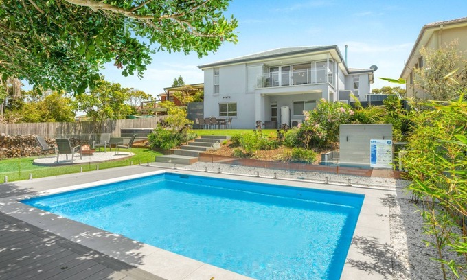 Culburra Beach House | Sea La Vie - Pet Friendly with Fireplace and Swimming Pool & Spa