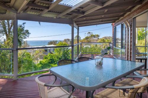 Malua Bay House | Whispering Palms - Ocean Views