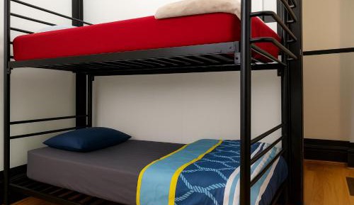 Single Bed in Dormitory Room