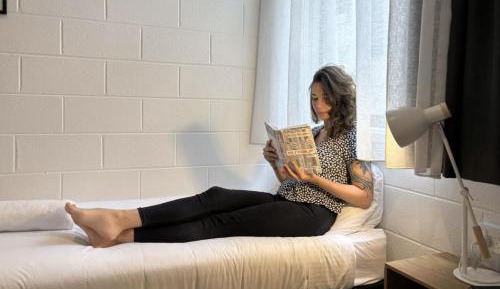 Bed in Twin Female Dormitory Room with Bathroom