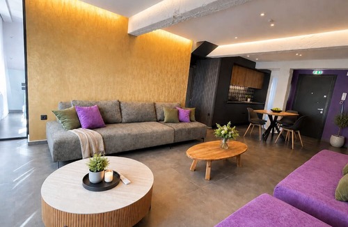 Koukaki Villa | Gold & Concrete Acropolis Residence